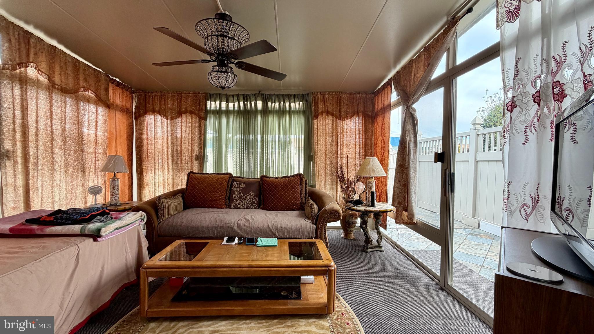 1829 Tomlinson Road Philadelphia, PA 19116 - Photo 6 of 15 a living room with furniture and a large window
