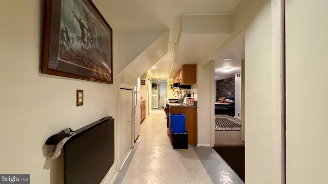 a view of a kitchen from the hallway