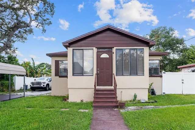 a front view of house with yard