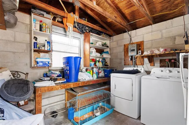 a storage room with washer and dryer