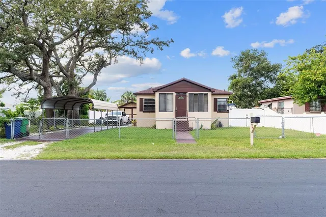 a house view with a garden space