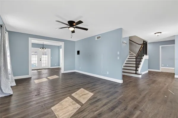 a view of entryway with wooden floor