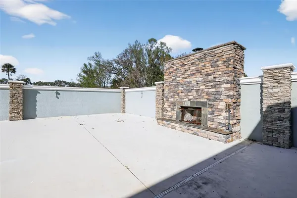 a view of a swimming pool with lounge chair