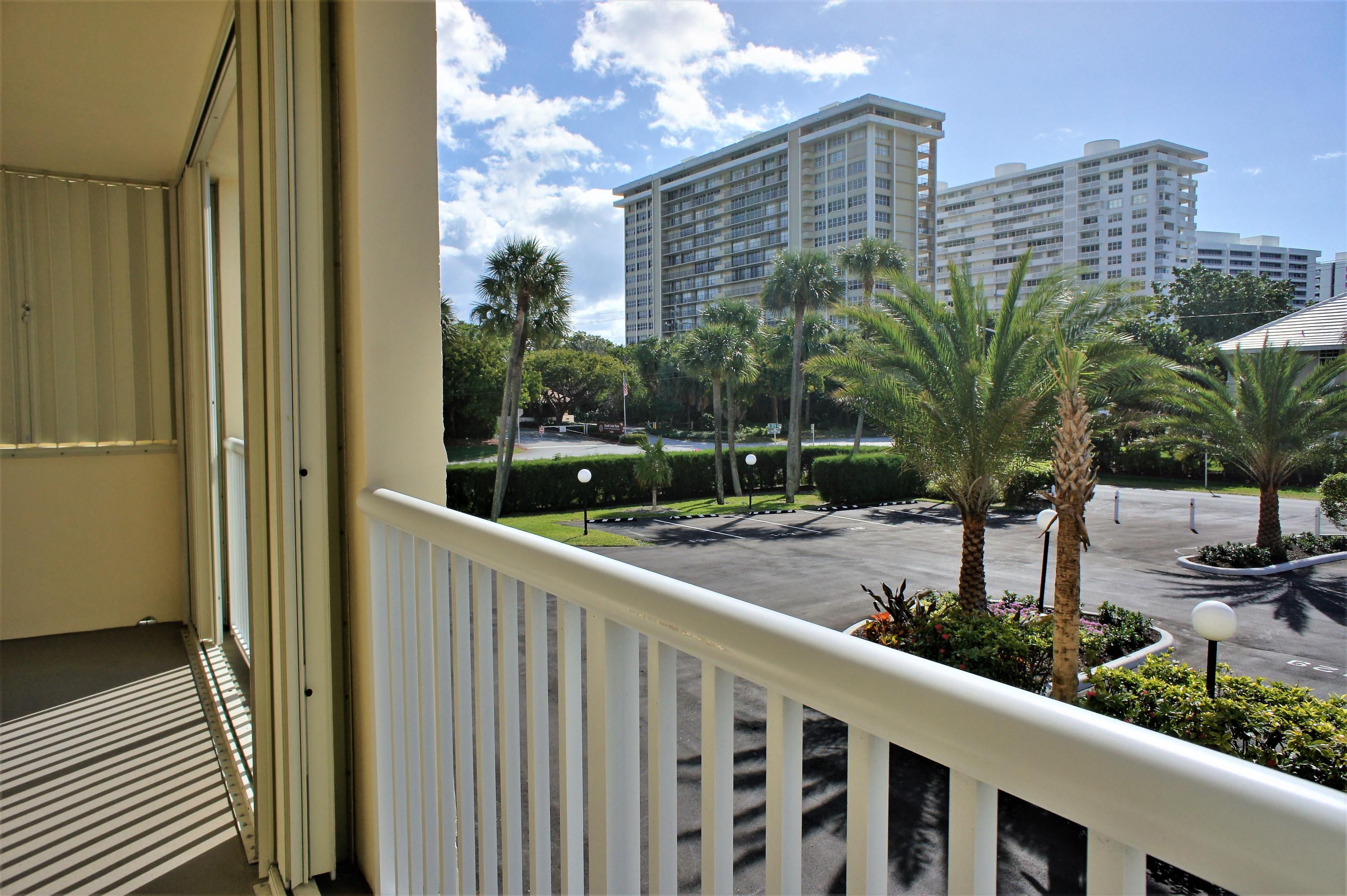 951 De Soto Road, Unit 234 Boca Raton, FL 33432 - Photo 21 of 44 a view of a balcony with a potted plants
