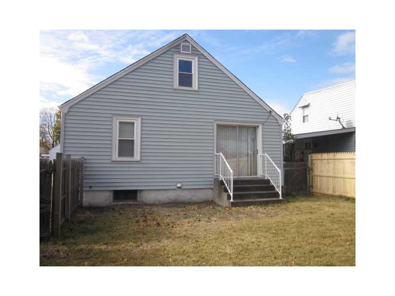 14 Hand Street Pawtucket, RI 02861 - Photo 2 of 19 Exterior Back. Sliding doors from dining room/family room to backyard