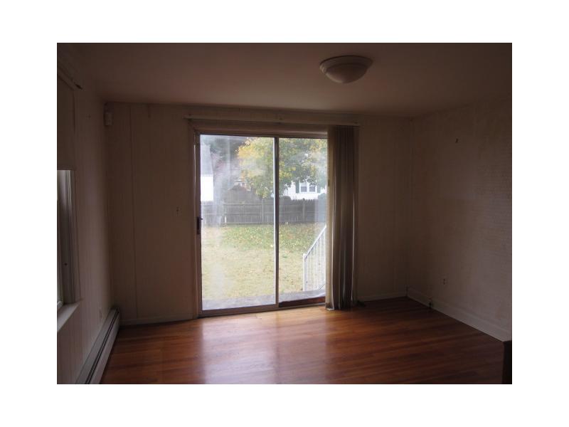 14 Hand Street Pawtucket, RI 02861 - Photo 5 of 19 Dining Room. Dining room or family room with sliders to backyard