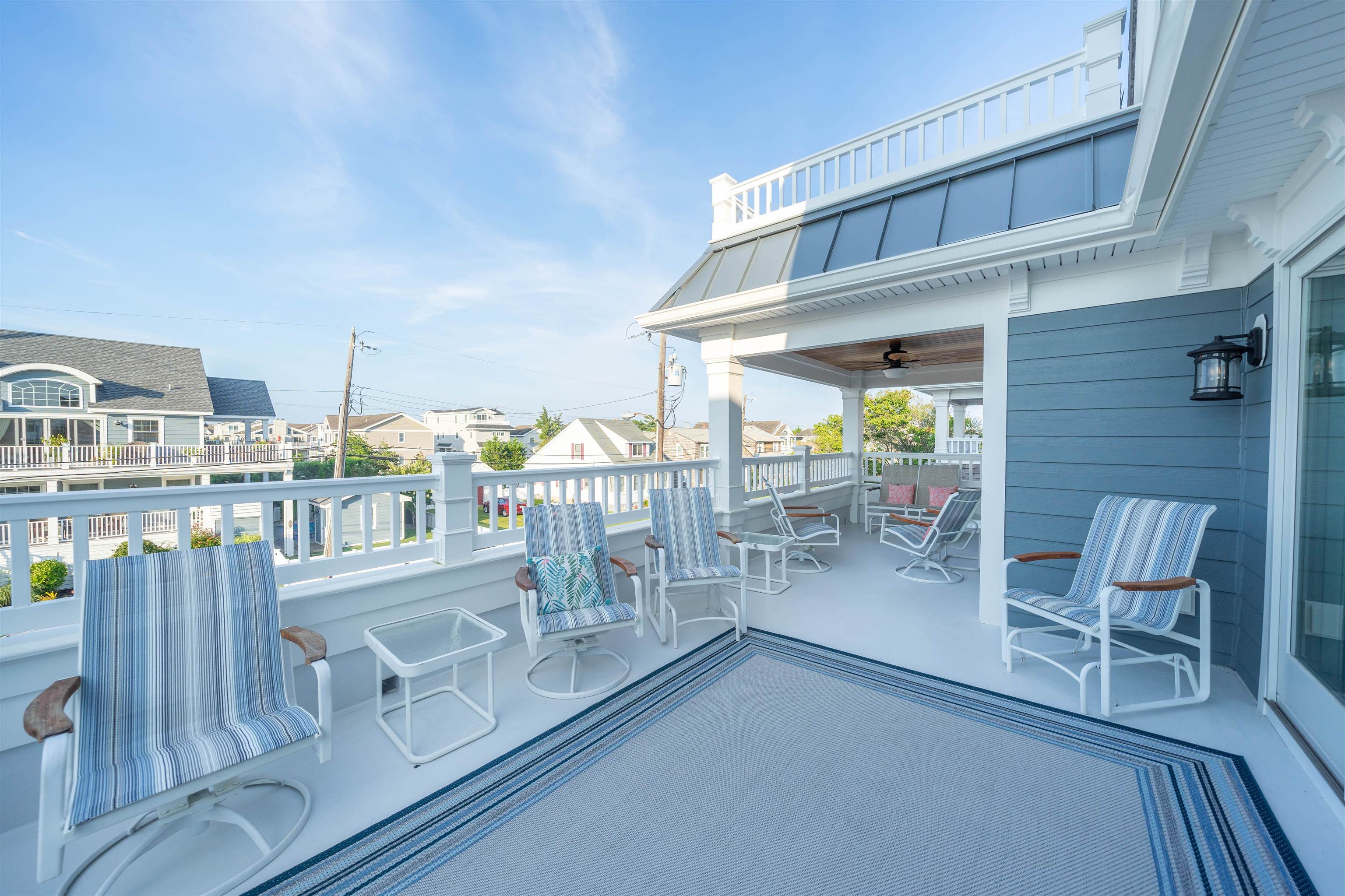 280 36th Avalon, NJ 08202 - Photo 13 of 46 a view of a chairs and table in patio of the house