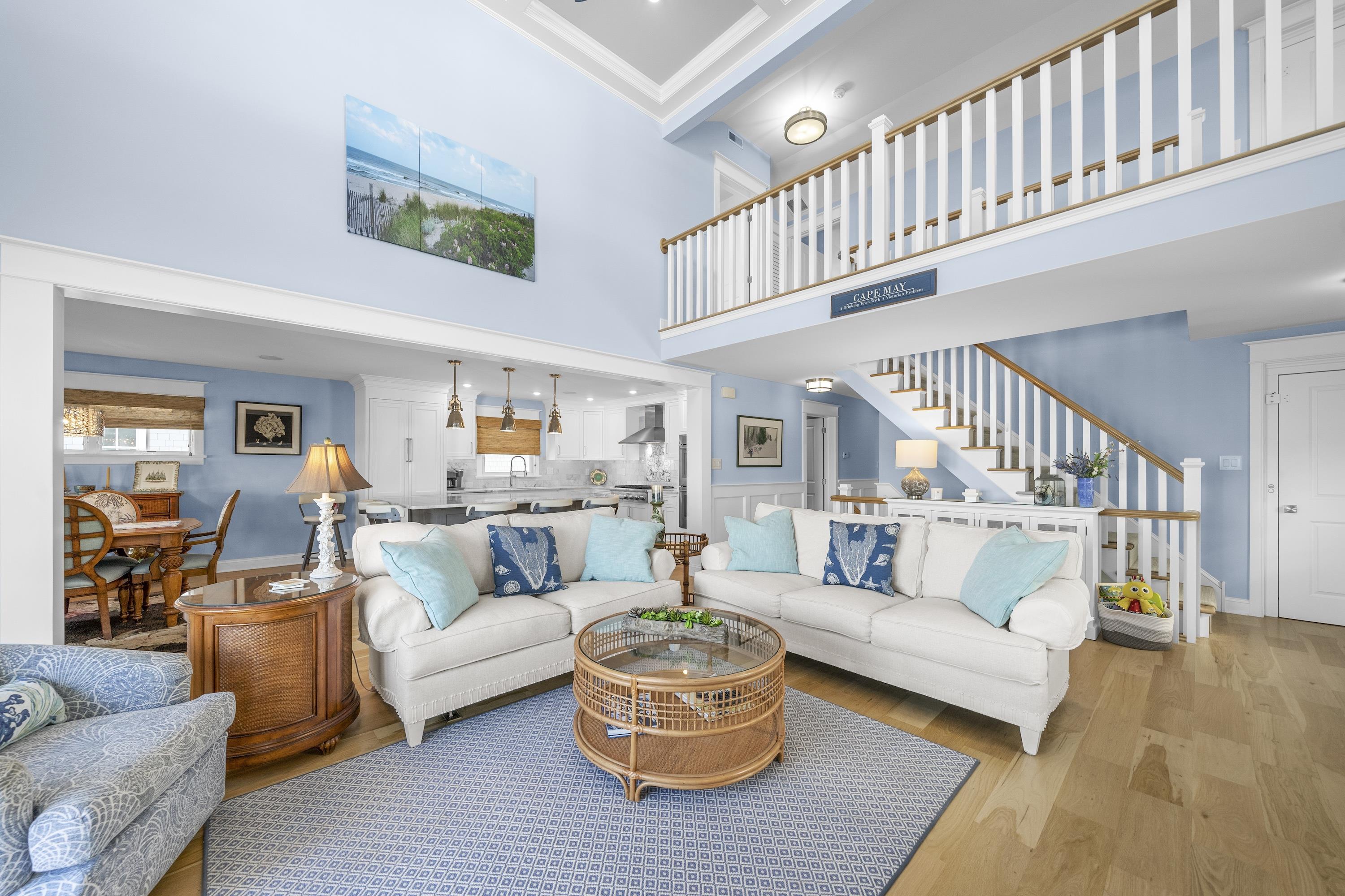 280 36th Avalon, NJ 08202 - Photo 14 of 46 a living room with furniture and a table