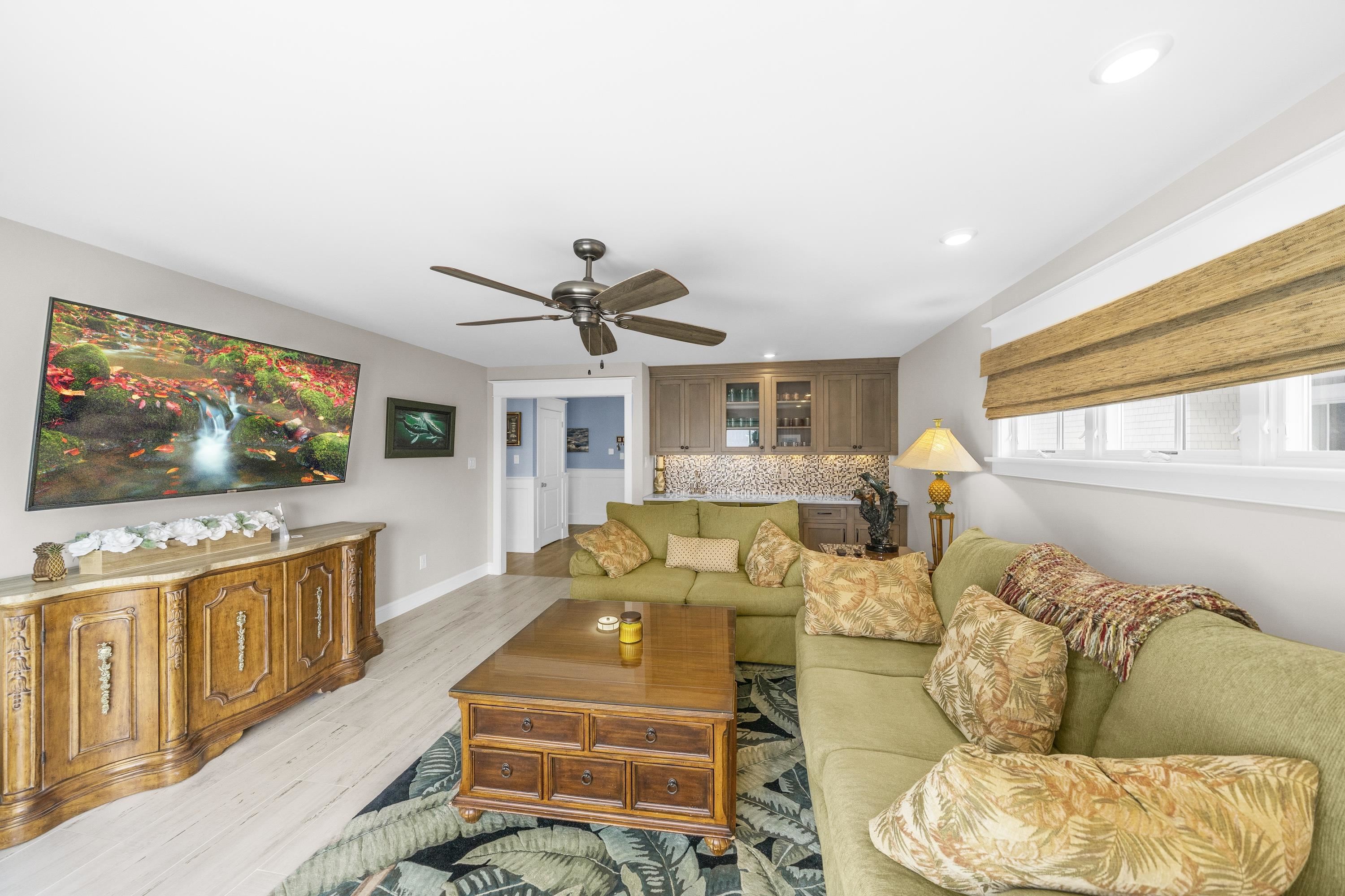 280 36th Avalon, NJ 08202 - Photo 17 of 46 a living room with furniture kitchen view and a large window