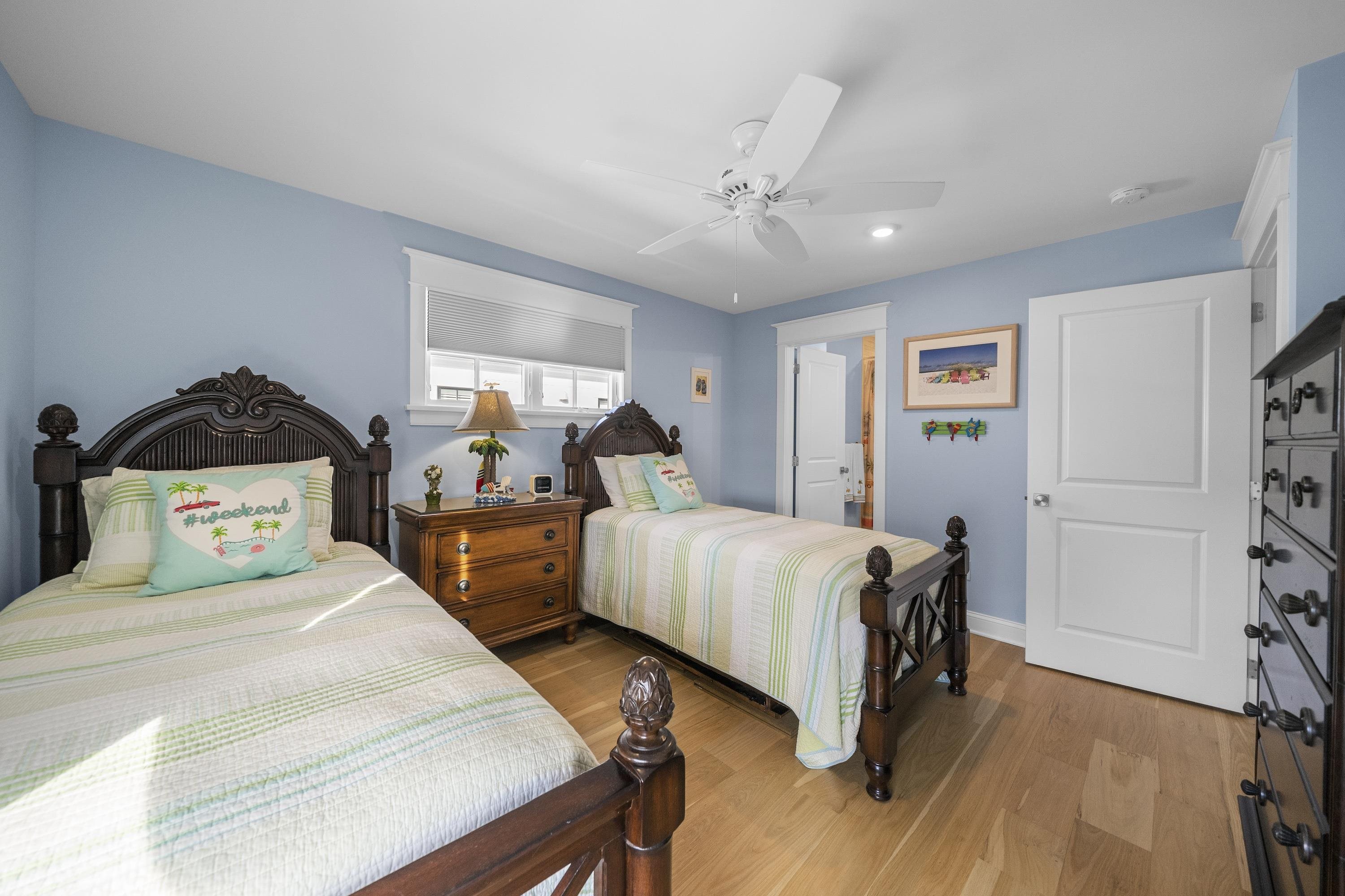 280 36th Avalon, NJ 08202 - Photo 24 of 46 a bedroom with two beds and painting on the wall