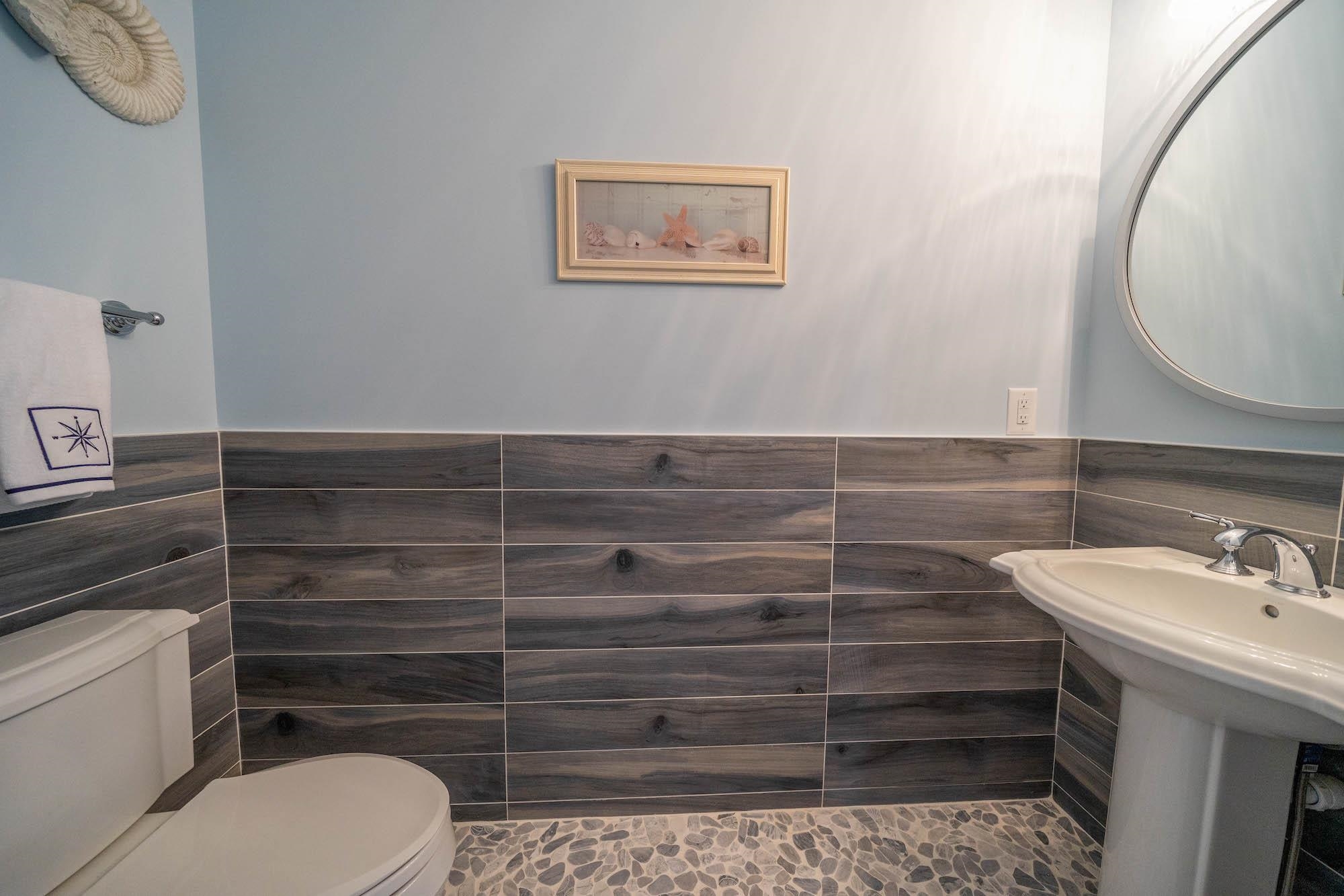 280 36th Avalon, NJ 08202 - Photo 39 of 46 a bathroom with a toilet and a sink