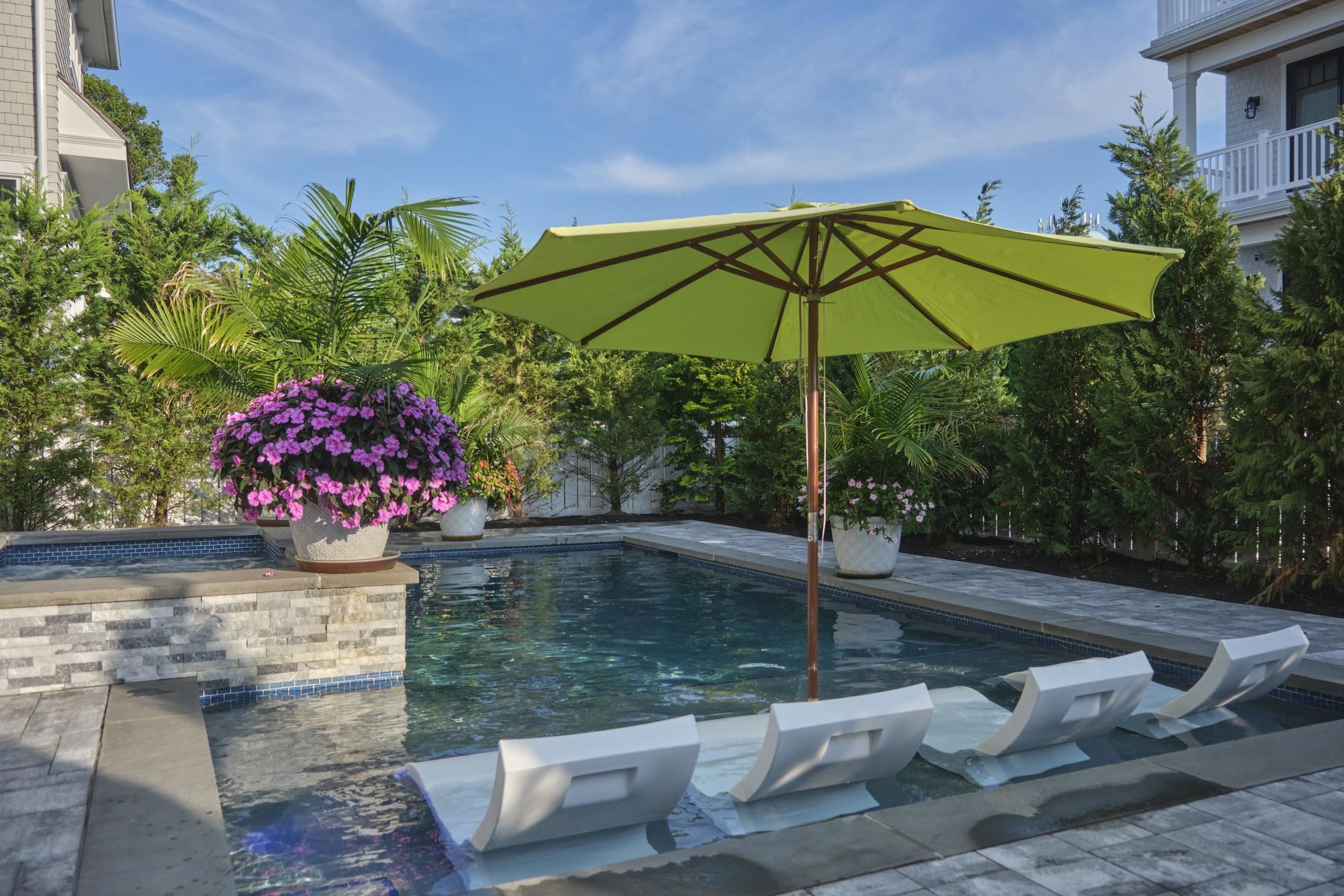 280 36th Avalon, NJ 08202 - Photo 45 of 46 a view of a backyard with plants