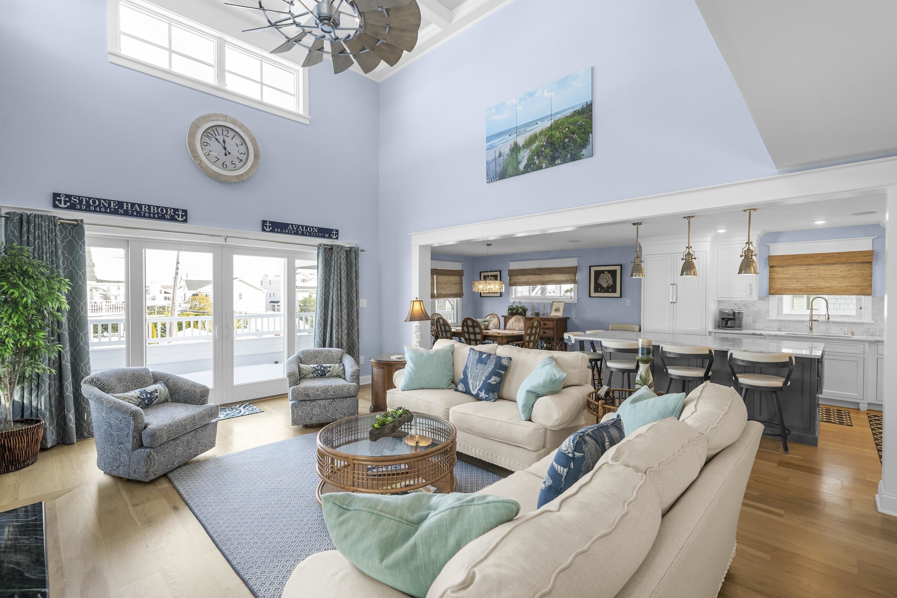 280 36th Avalon, NJ 08202 - Photo 5 of 46 a living room with furniture a clock and windows