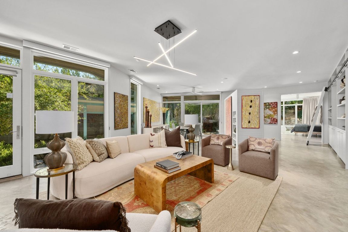 3705 Bridle Path Austin, TX 78703 - Photo 2 of 26 a living room with furniture and a large window