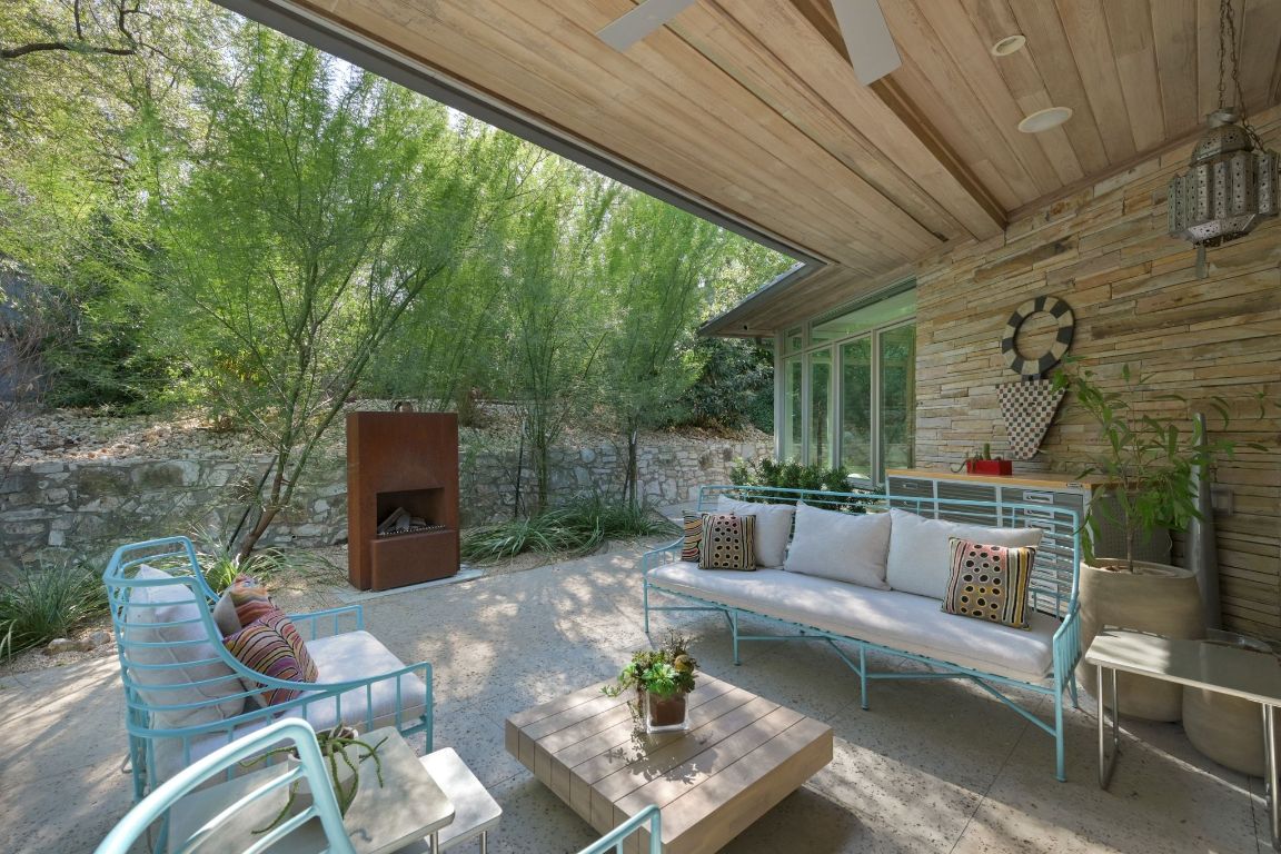 3705 Bridle Path Austin, TX 78703 - Photo 24 of 26 a outdoor living space with furniture and garden view