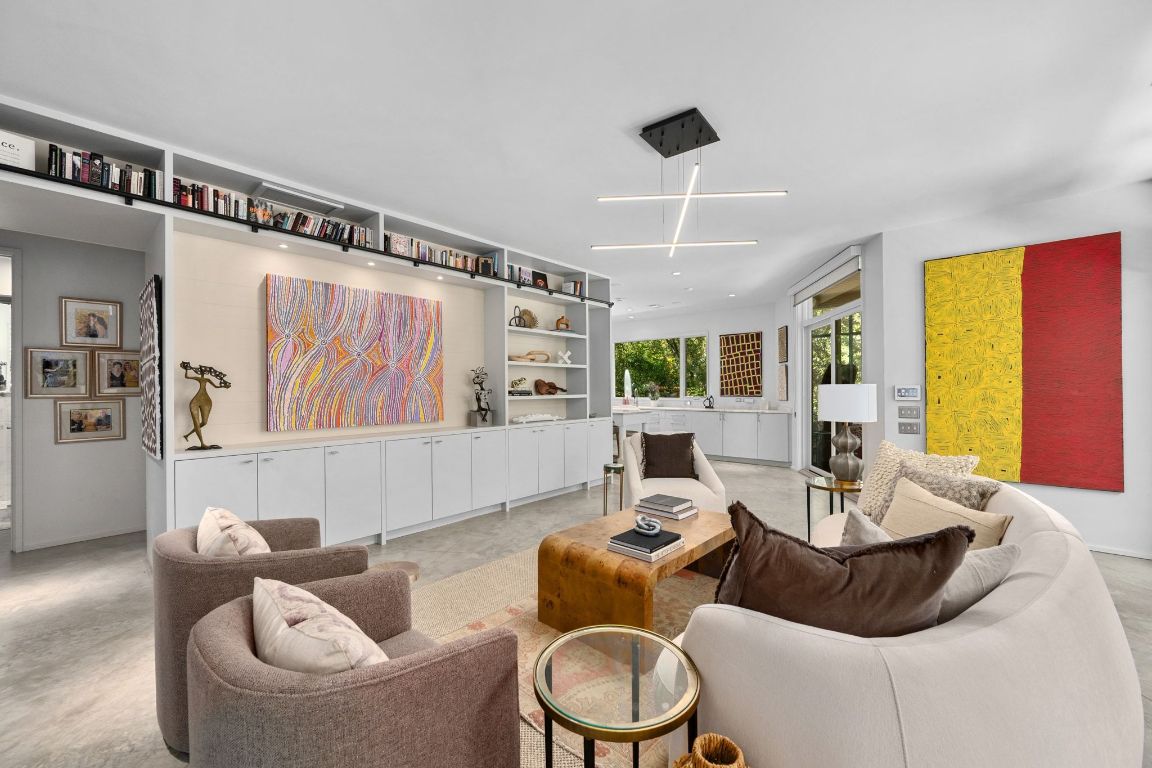 3705 Bridle Path Austin, TX 78703 - Photo 4 of 26 a living room with furniture and a large window