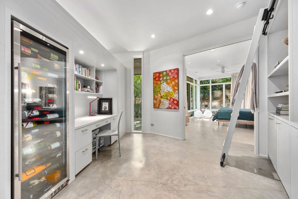 3705 Bridle Path Austin, TX 78703 - Photo 10 of 26 a living room with furniture and a flat screen tv