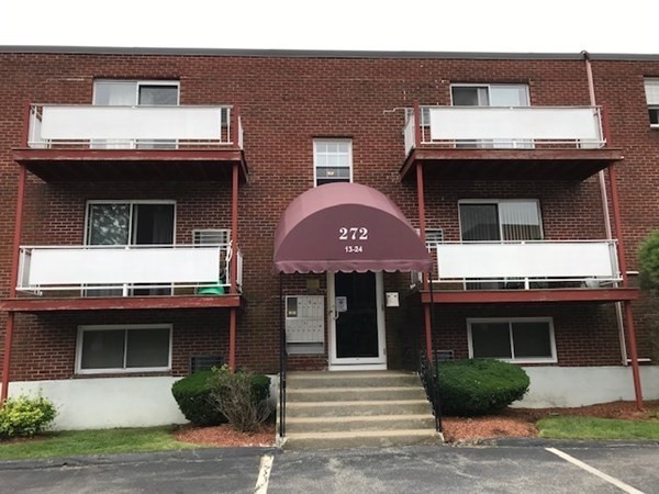 a front view of a house with a garage