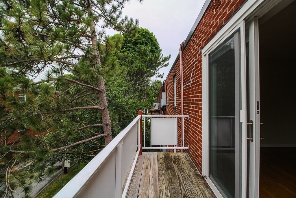 272 Albion Street, Unit 23 Wakefield, MA 01880 - Photo 12 of 33 a view of balcony and deck