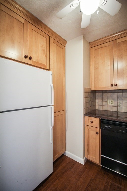 272 Albion Street, Unit 23 Wakefield, MA 01880 - Photo 16 of 33 a view of cabinets and wooden floor