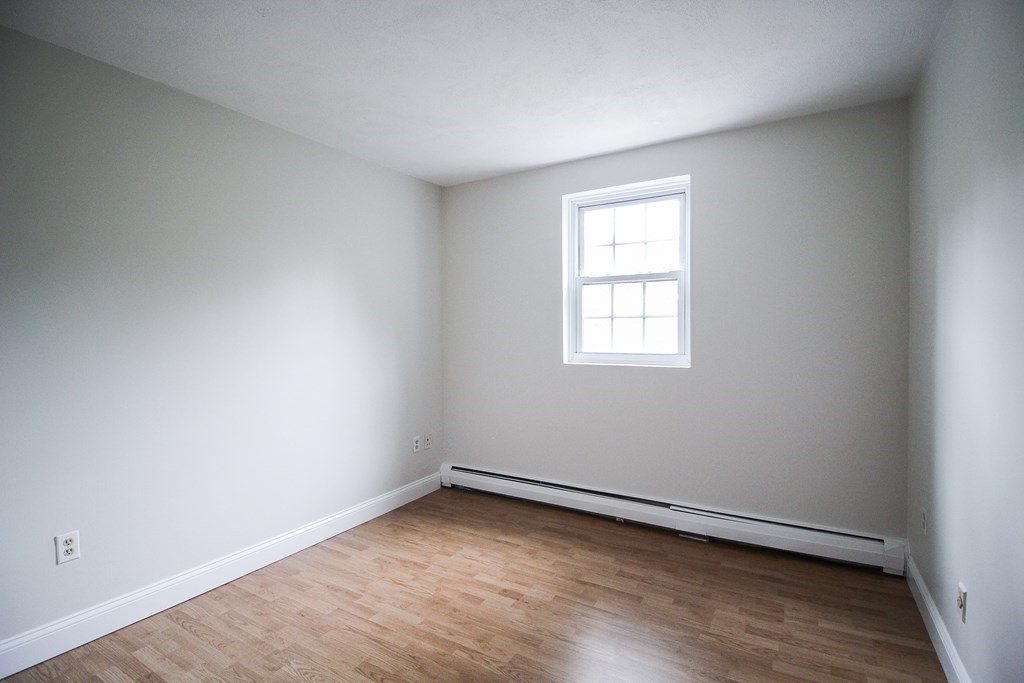 272 Albion Street, Unit 23 Wakefield, MA 01880 - Photo 27 of 33 an empty room with a window