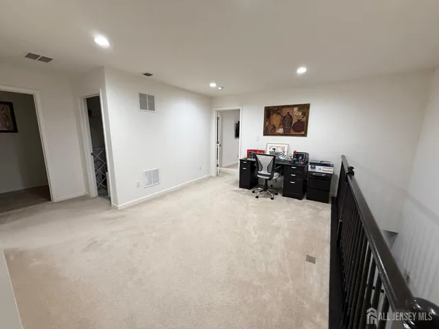 a view of a livingroom with furniture and furniture