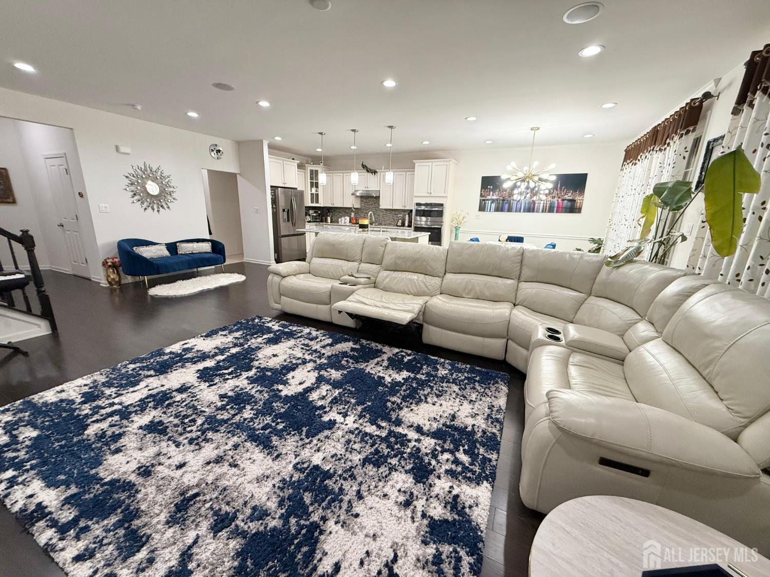 39 Periwinkle Drive, Unit 9 Monroe Township, NJ 08831 - Photo 2 of 26 a living room with furniture and a couch