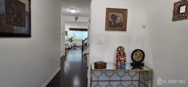 a view of entryway with wooden floor