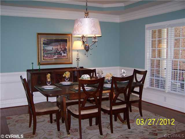13343 Tipple Point Road Midlothian, VA 23114 - Photo 3 of 12 a view of a dining room with furniture and wooden floor