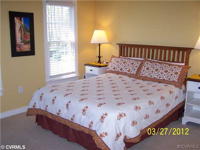 13343 Tipple Point Road Midlothian, VA 23114 - Photo 9 of 12 a bedroom with a bed and a window