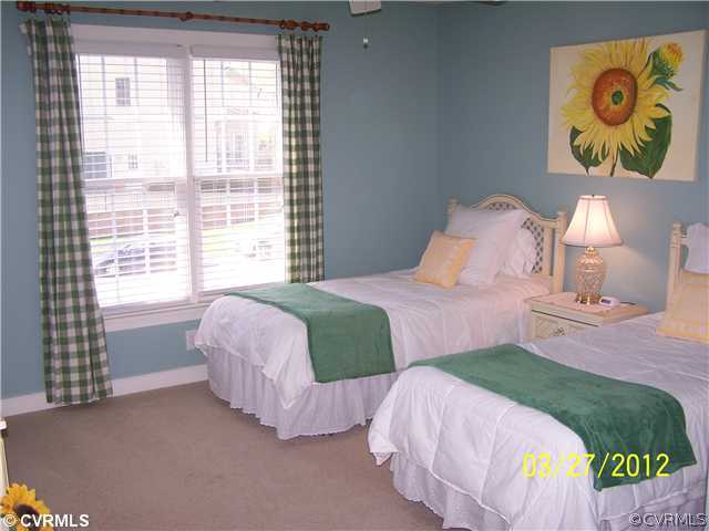 13343 Tipple Point Road Midlothian, VA 23114 - Photo 10 of 12 a bedroom with two beds and painting on the wall