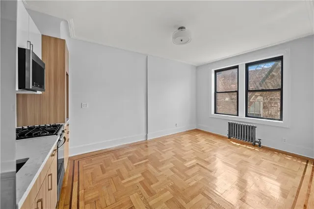 a view of an empty room and window