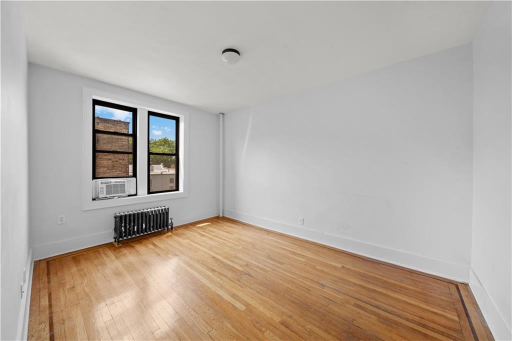 219 78th Street, Unit 3D Brooklyn, NY 11209 - Photo 7 of 10 an empty room with a window