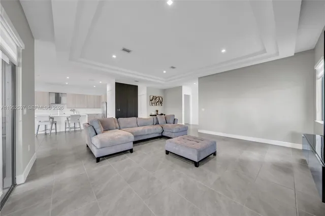 a living room with furniture and a couch