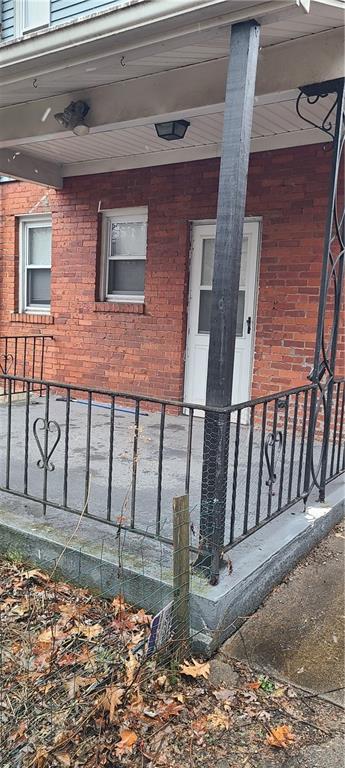 206 Brighton Road Pittsburgh, PA 15202 - Photo 11 of 20 a view of a house with wooden fence