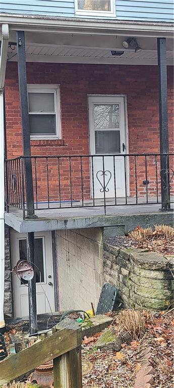 206 Brighton Road Pittsburgh, PA 15202 - Photo 17 of 20 a front view of a house with a yard