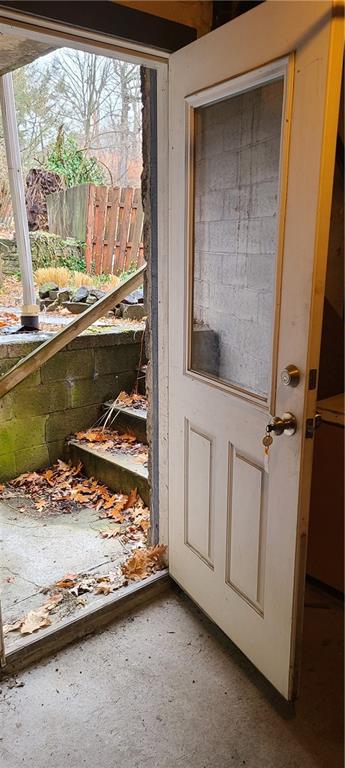 206 Brighton Road Pittsburgh, PA 15202 - Photo 3 of 20 a view of a bedroom with wooden floor and a window