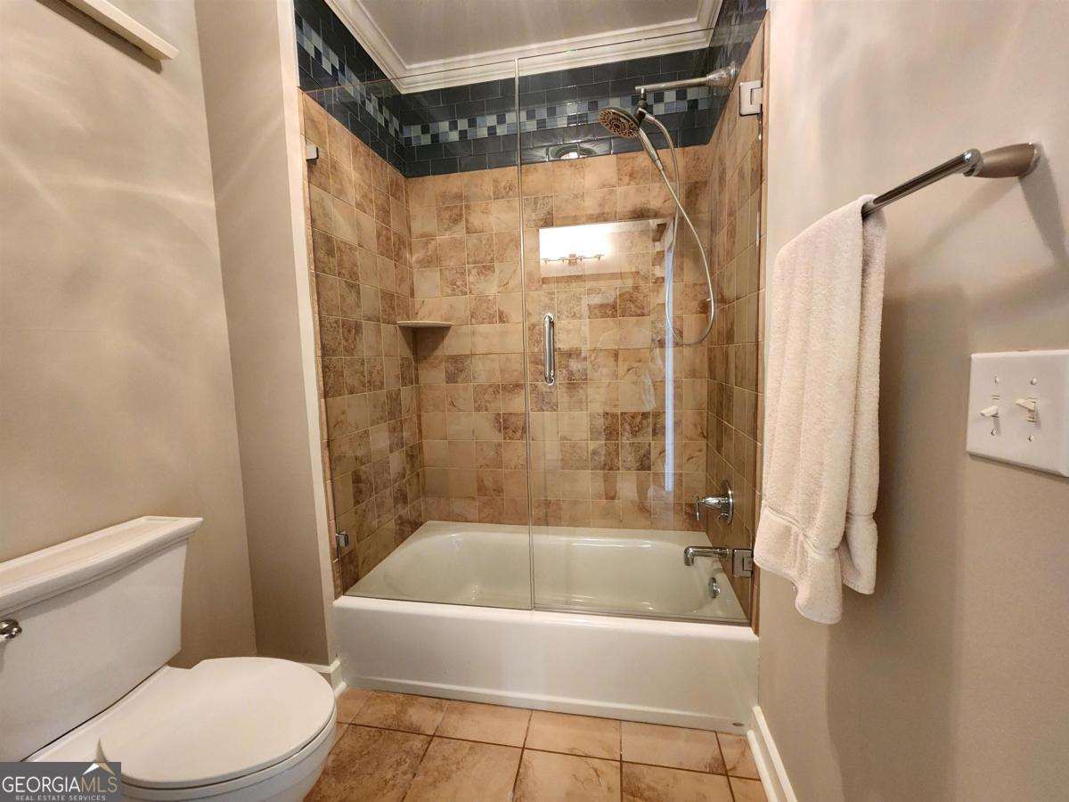 109 (unit 1203) South Bay Road Eatonton, GA 31024 - Photo 32 of 55 a bathroom with a bathtub and a shower