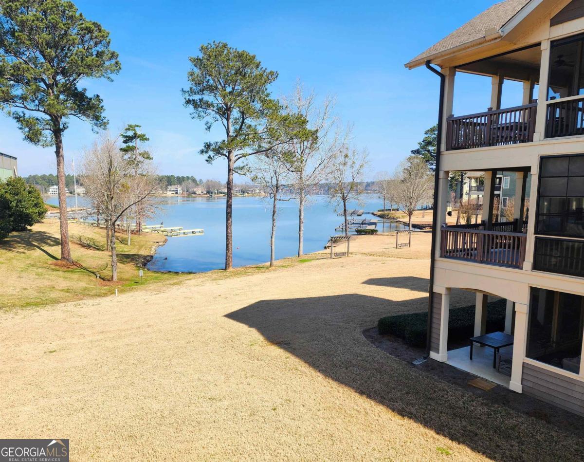 109 (unit 1203) South Bay Road Eatonton, GA 31024 - Photo 38 of 55 a view of a swimming pool with a chair