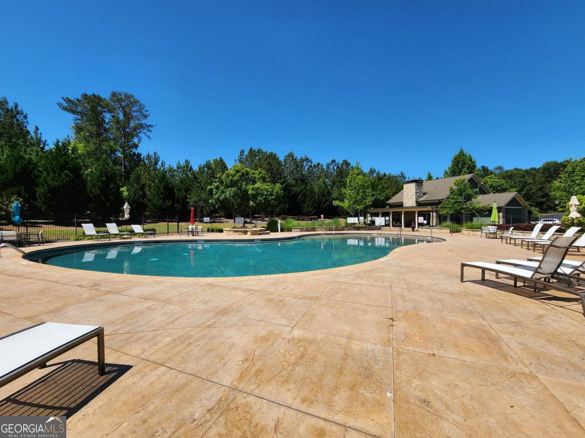 109 (unit 1203) South Bay Road Eatonton, GA 31024 - Photo 51 of 55 a view of outdoor space with playground and green space