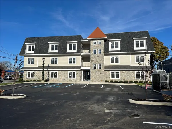 a front view of a building with street view