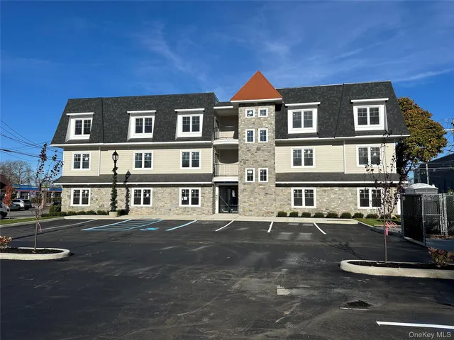 a front view of a building with street view