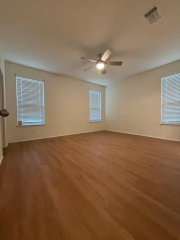a bathroom with a sink vanity and mirror
