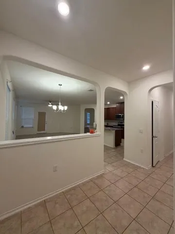 a view of a kitchen with a sink