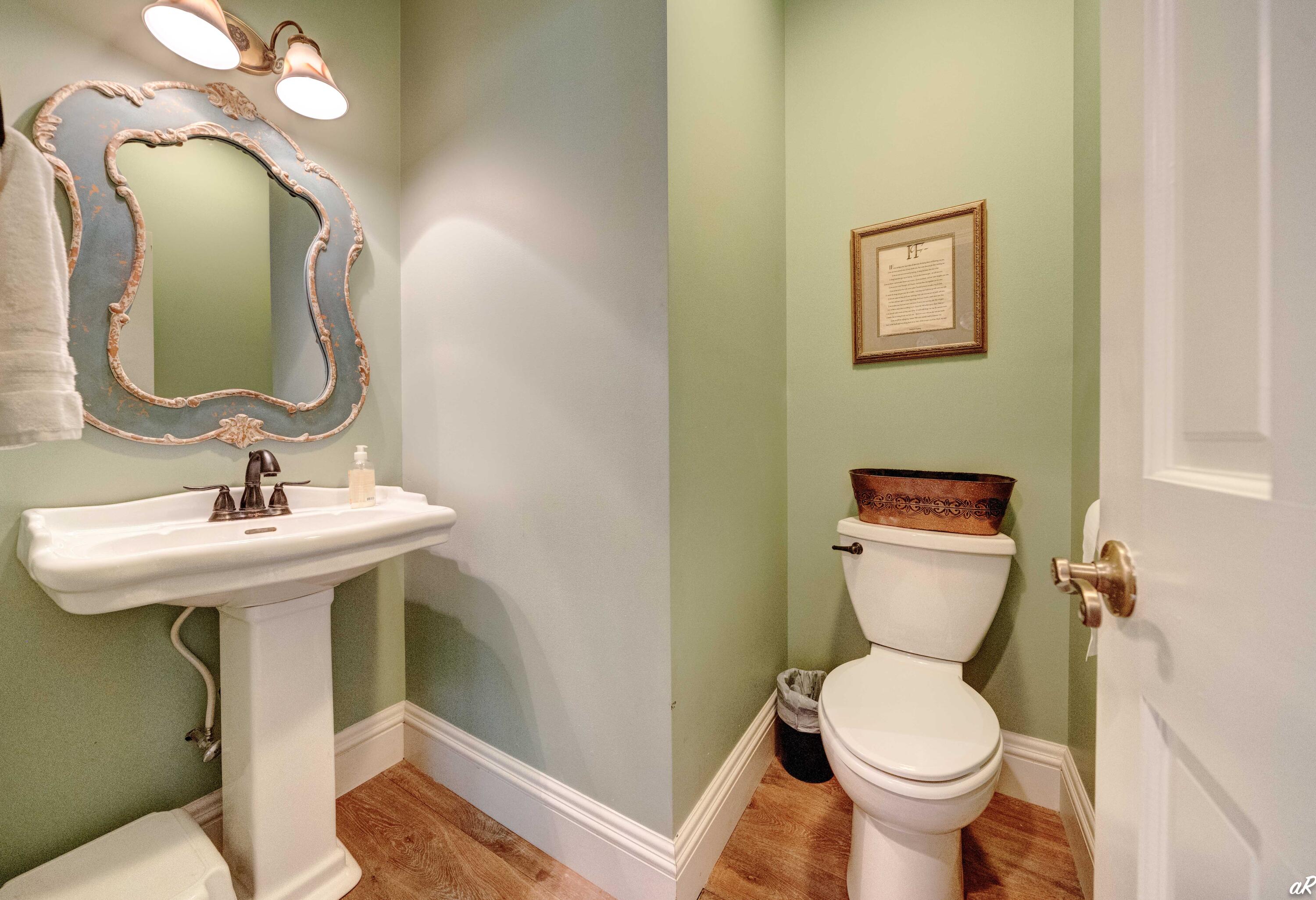 2513 Highway 79 Vernon, FL 32462 - Photo 11 of 85 a bathroom with a toilet sink and mirror