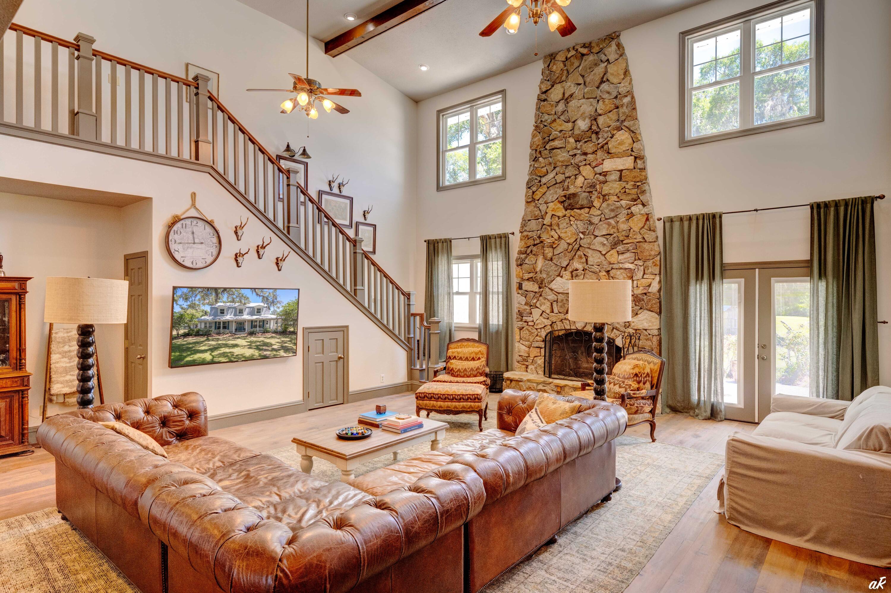 2513 Highway 79 Vernon, FL 32462 - Photo 13 of 85 a living room with fireplace furniture and a large window