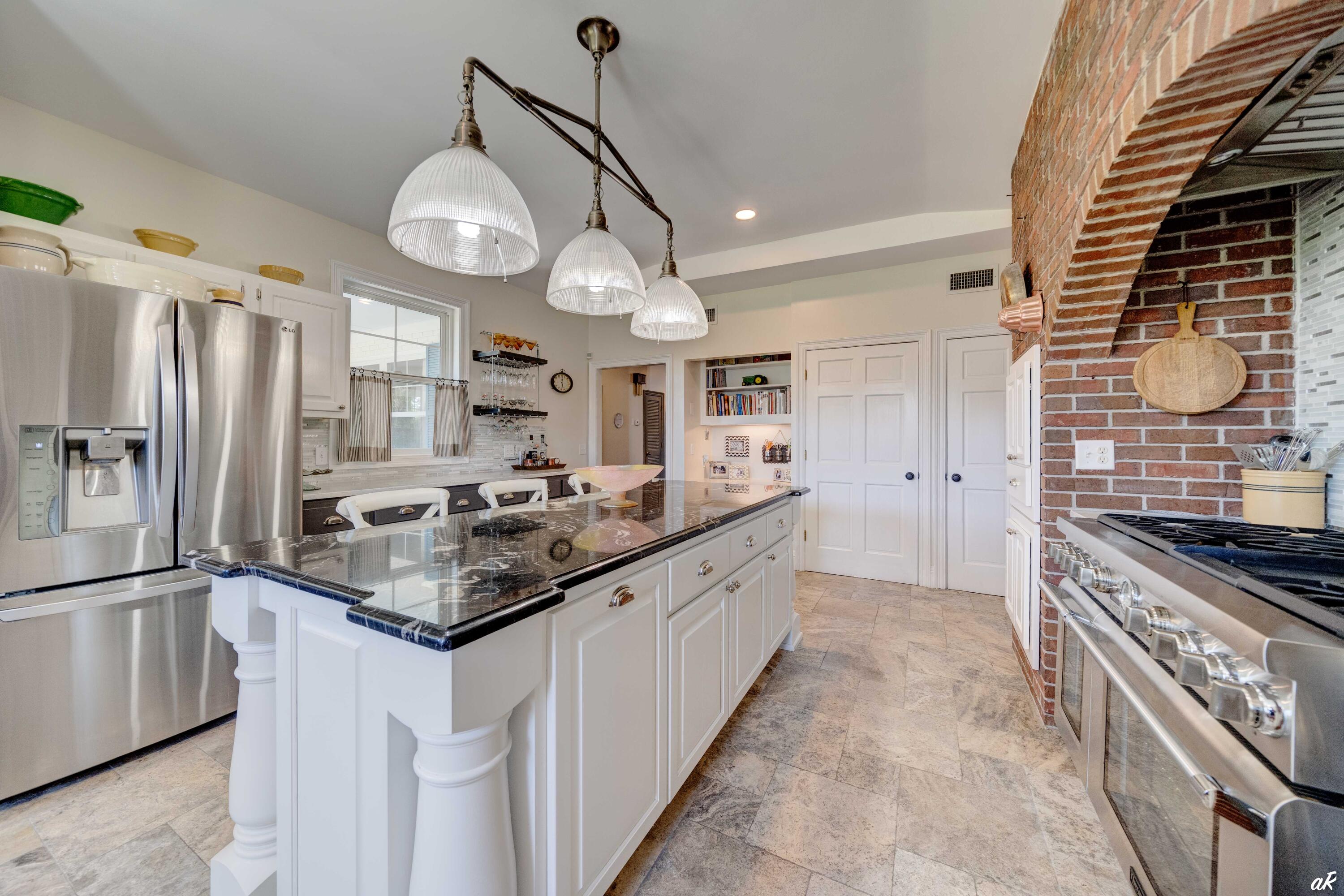 2513 Highway 79 Vernon, FL 32462 - Photo 16 of 85 a kitchen with stainless steel appliances granite countertop a stove and a sink