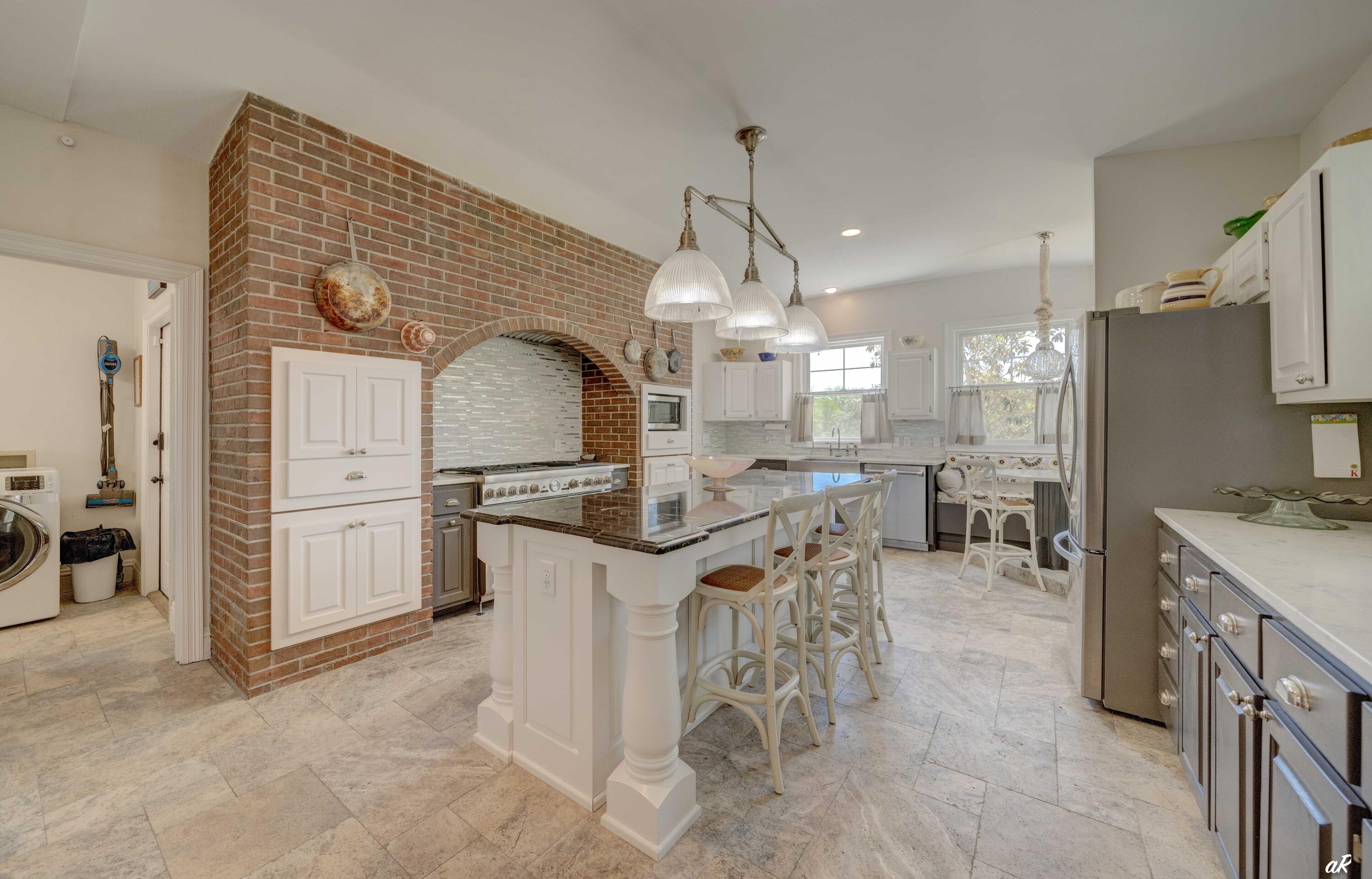 2513 Highway 79 Vernon, FL 32462 - Photo 21 of 85 a kitchen with stainless steel appliances kitchen island a chandelier