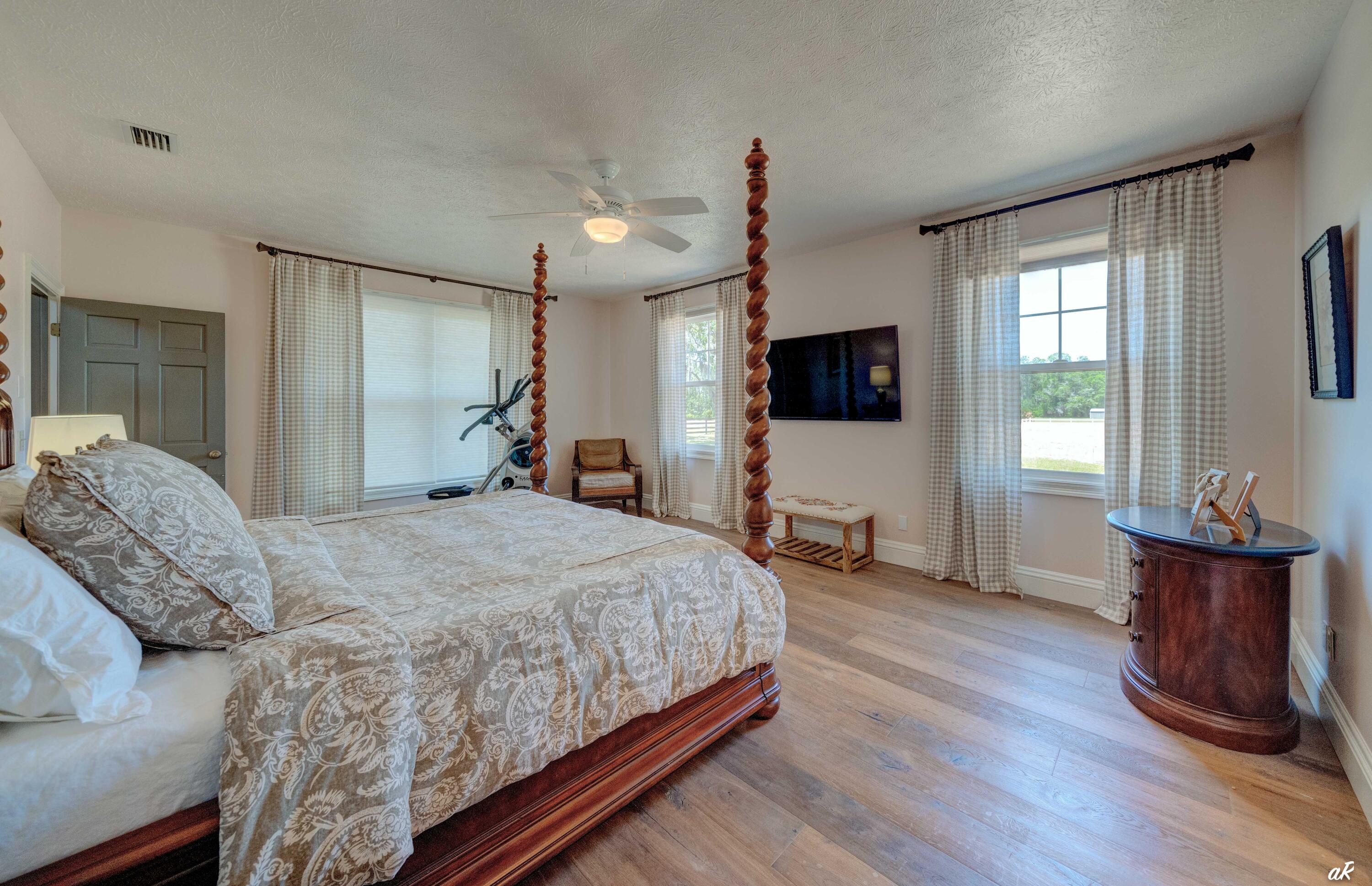 2513 Highway 79 Vernon, FL 32462 - Photo 26 of 85 a bedroom with a bed window and a television