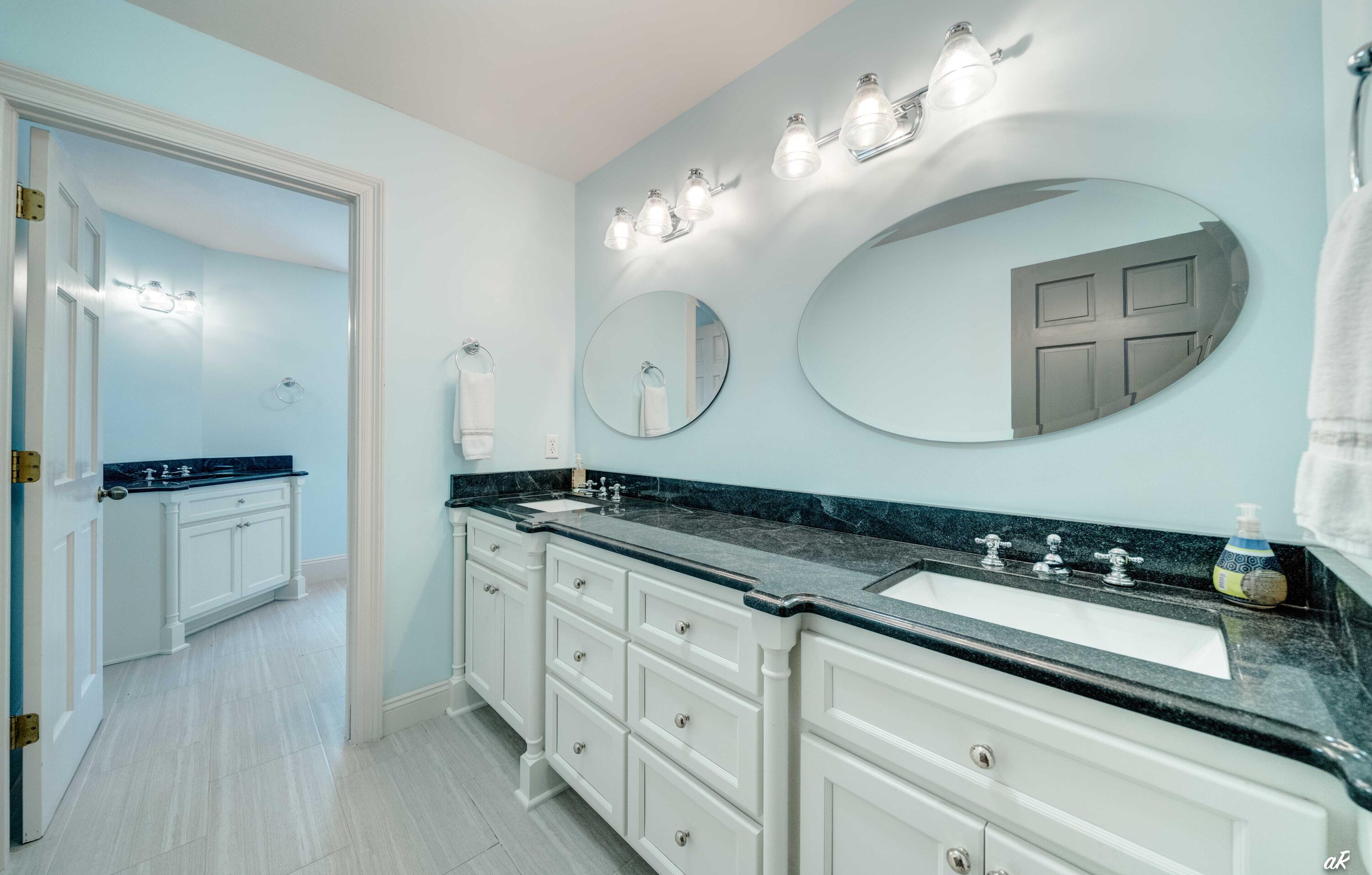 2513 Highway 79 Vernon, FL 32462 - Photo 37 of 85 a bathroom with a double vanity sink and a mirror